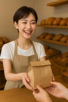 パン屋さんで働く素敵な女性 パン屋さんで働く素敵な女性の写真