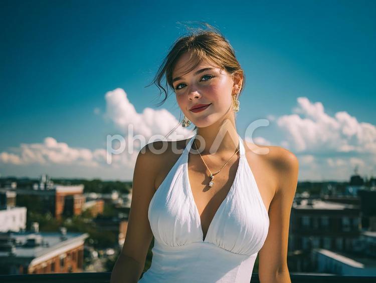 都会の屋上から見下ろすポートレート 女性,笑顔,ポートレートの写真素材
