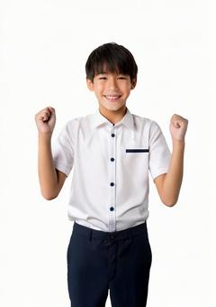 ガッツポーズをする男子学生 ガッツポーズをする男子学生の写真