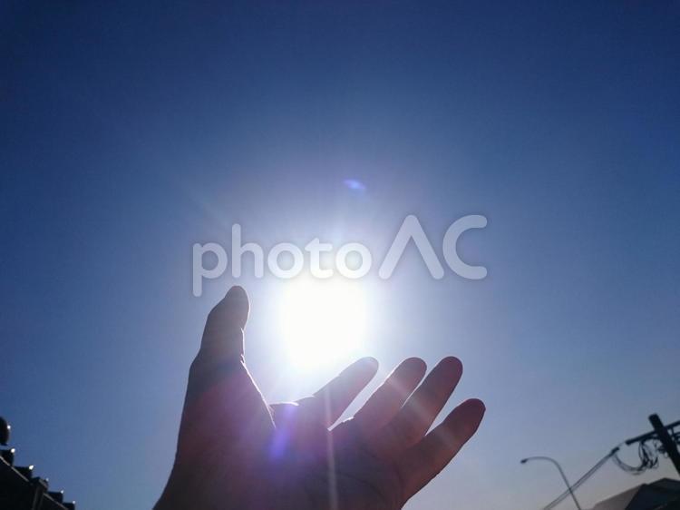 おひさまをすくう おひさま,すくう,ぼかしの写真素材