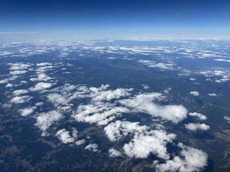 上空から見た雲と山々のパノラマの絶景﻿ 山,景観,風景の写真素材
