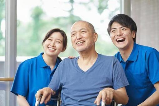 Laughing elderly and caregivers, nurses, senior citizens, male, JPG