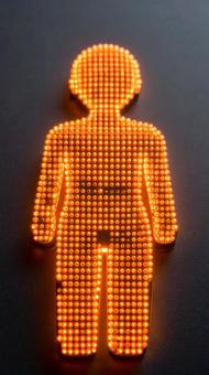 人のシルエットにした電球 人のシルエットにした電球の写真