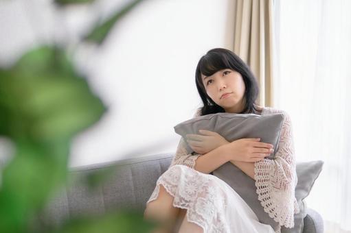 Image of a woman living alone with anxiety, JPG Image of a woman living alone with anxiety, female, anxiety, stress, JPG