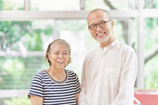 Elderly couple standing with a smile, senior citizens, couple, a smile, JPG