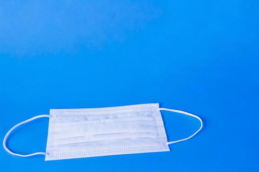 Simple mask on blue background, JPG Simple mask on blue background, JPG
