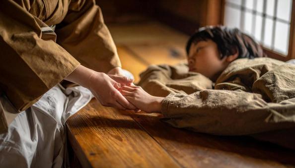 昔話 病気の男の子が手を差し伸べる 昔話 病気の男の子が手を差し伸べるの写真