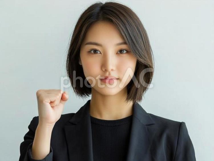 こぶしを固めるビジネスウーマンのイメージ 女性,ビジネス,こぶしの写真素材