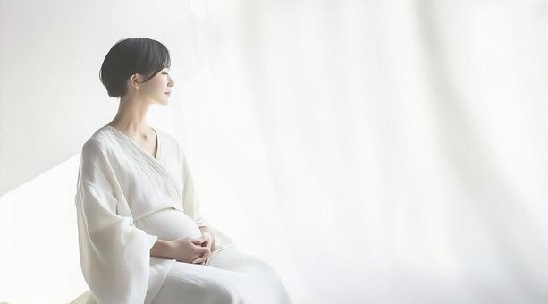 優しい表情の妊婦のポートレート 優しい表情の妊婦のポートレートの写真