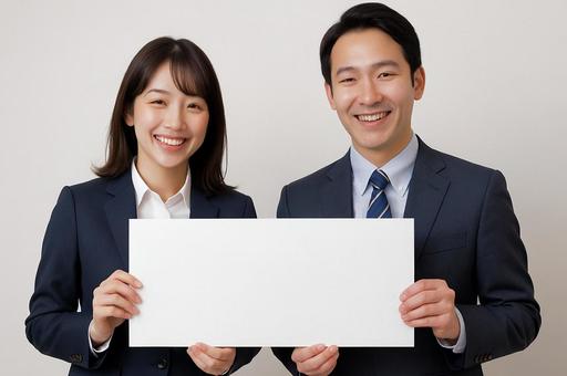 プラカードを持つ男女 プラカードを持つ男女の写真