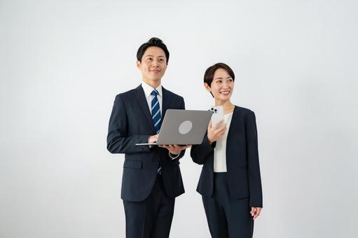 男女のサラリーマン 男女のサラリーマン オフィス,ビジネス,仲間の写真素材
