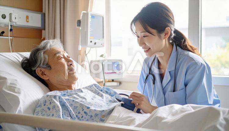 患者の血圧を測る看護師 医療,看護師,患者の写真素材