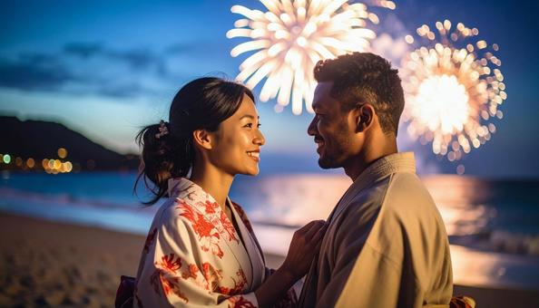 打ち上げ花火と浴衣の男女 打ち上げ花火と浴衣の男女の写真