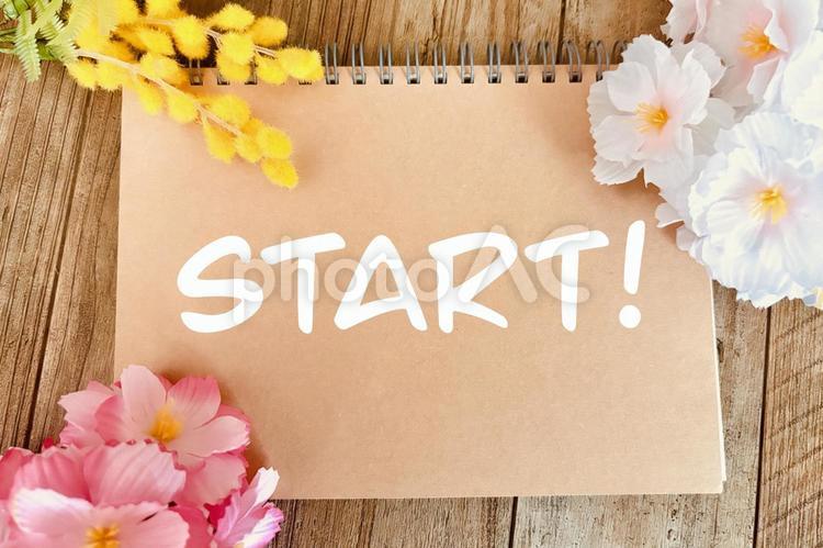 STARTと書いたスケッチブックと桜 スタート,start,始まるの写真素材