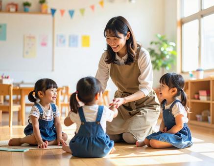 子どもの世話をする保育士 子どもの世話をする保育士の写真