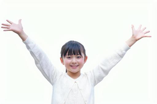 両手を広げて上げる女の子（白背景） 子ども,女の子,小学生の写真素材