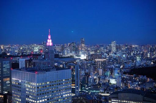 青い空と輝く都心の夜景 青い空と輝く都心の夜景 夜景,都市,都会の写真素材