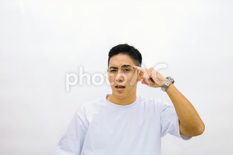 こめかみを抑える男性 日本人,男性,アジア人の写真素材
