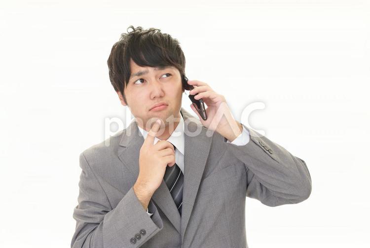 スマホを持つ男性 スマホ,ビジネス,スマートフォンの写真素材