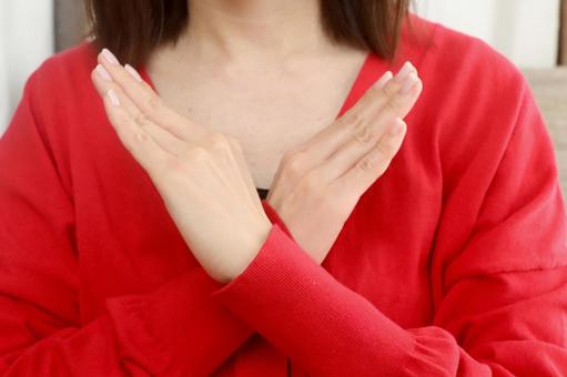 バツポーズの女性 バツポーズの女性 バツ,ばつ,ダメの写真素材