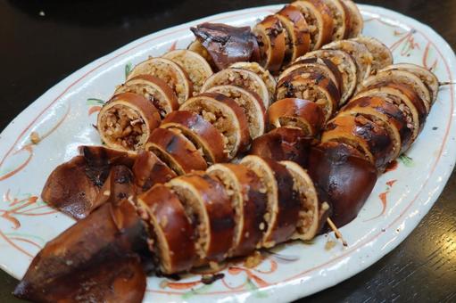 イカメシの輪切り(斜めアングル) イカメシの輪切り(斜めアングル) イカ,スルメイカ,イカメシの写真素材