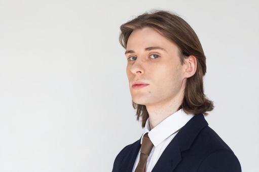 カメラ目線のスーツの男性 男性,外国人,欧米人の写真素材