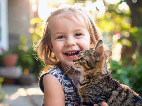 子供とネコ 子供とネコの写真