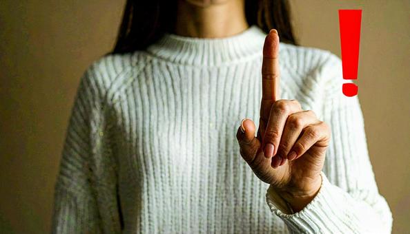 注意! 赤い「!」と人差し指 注意! 赤い「!」と人差し指の写真