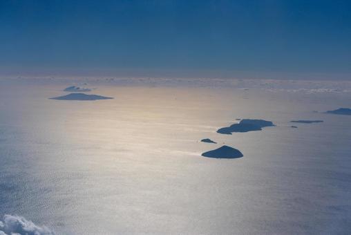 上空からの群島と輝く海 海,空,島の写真素材