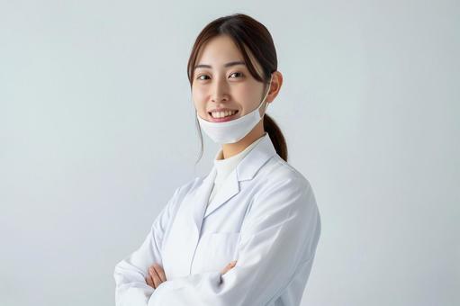 優しい女性歯科医師の笑顔 優しい女性歯科医師の笑顔の写真