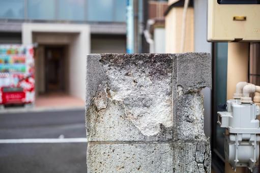 A block wall that has partially collapsed due to aging, JPG