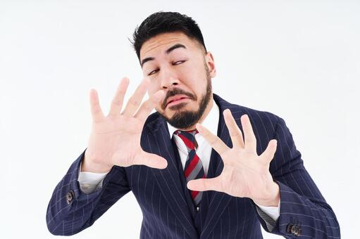 拒絶のポーズをするスーツ姿の男性  拒絶,拒否,ビジネスマンの写真素材