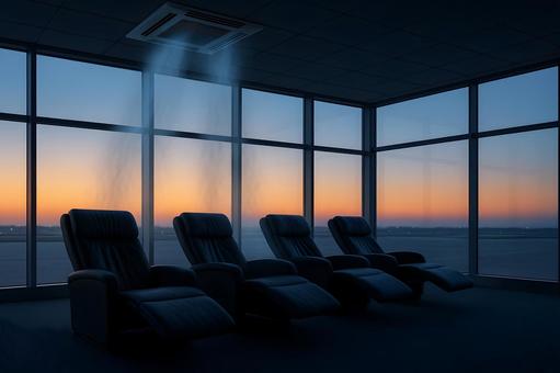 朝焼けの空港ラウンジ 朝焼けの空港ラウンジの写真