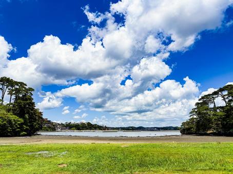 福浦島の海岸と夏空 松島,海,白い雲の写真素材