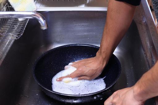 流し台で洗い物 流し台,シンク,台所の写真素材
