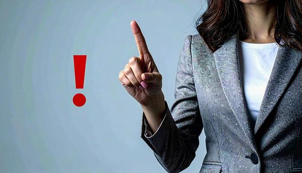 注意! 赤い「!」と人差し指 注意! 赤い「!」と人差し指の写真