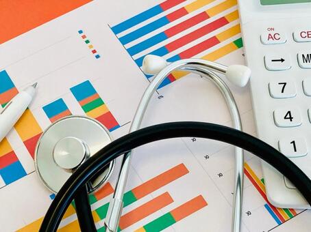 聴診器と電卓とカラフルグラフ グラフ,医療,電卓の写真素材