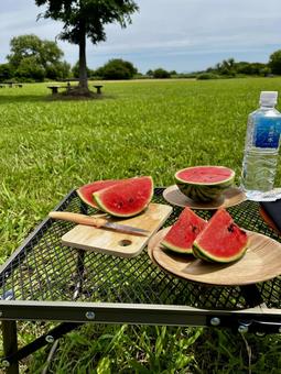 夏のキャンプ 夏のキャンプ キャンプ,スイカ,すいかの写真素材
