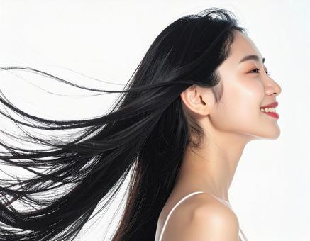 長い髪がなびいている 若い笑顔の女性 9 長い髪がなびいている 若い笑顔の女性 9の写真
