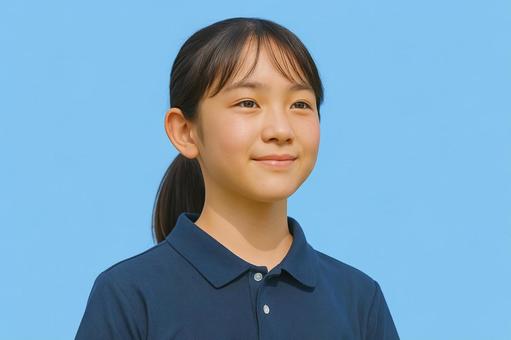 青空と中学生の笑顔の女の子 青空と中学生の笑顔の女の子の写真