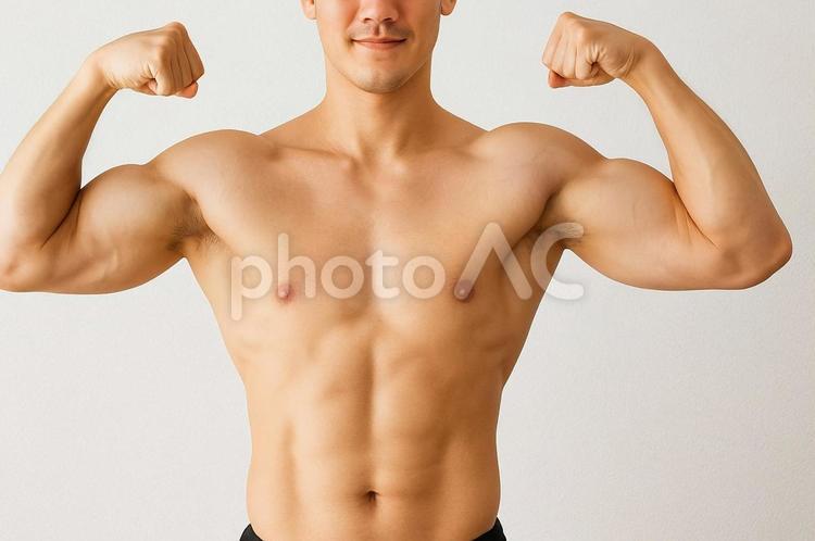 筋肉を見せる若い男性・ボディビル・筋トレ 筋トレ,ボディビル,男性の写真素材