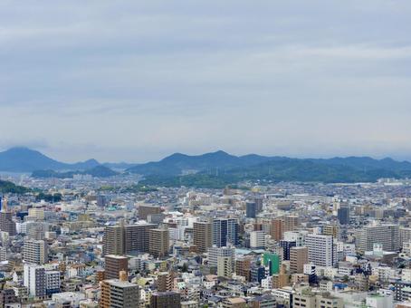 松山城から見下ろす松山市北部市街地2 松山城から見下ろす松山市北部市街地2 松山市,松山城,地方都市の写真素材