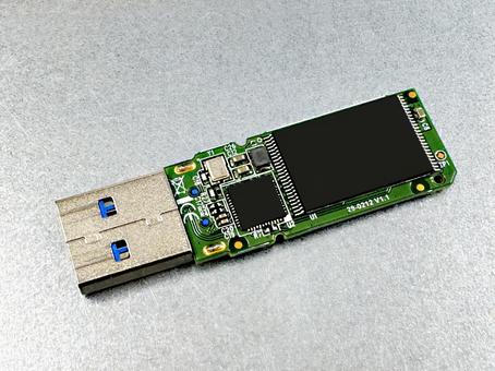 USBメモリー64G 裏 usbメモリー3.0,データ,ビジネスの写真素材