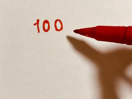 100と書く 100と書く 赤,レッド,マークの写真素材