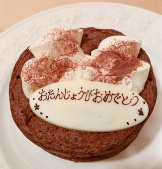 チョコレートのお誕生日ケーキ チョコレートのお誕生日ケーキ ガトーショコラ,チョコレートケーキ,ホイップクリームの写真素材