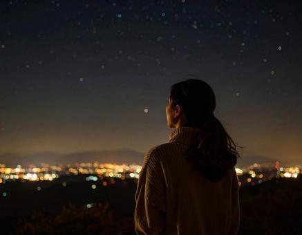 空を見る女性 空を見る女性の写真