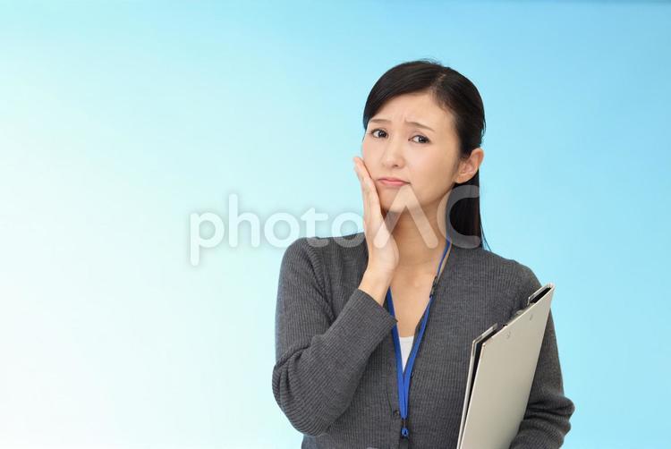 困惑したい表情のビジネスウーマン 女性,ビジネウーマン,女の写真素材