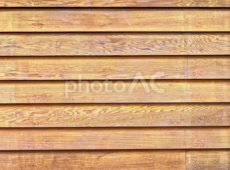 複数枚の板が張られた外壁　シンプルな木目 壁,板張り,板の写真素材