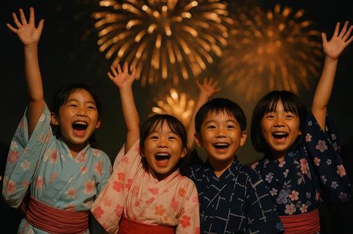 花火に歓声を上げる子どもたち 花火に歓声を上げる子どもたちの写真