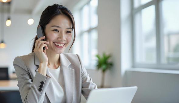 スマホ 若い女性の写真